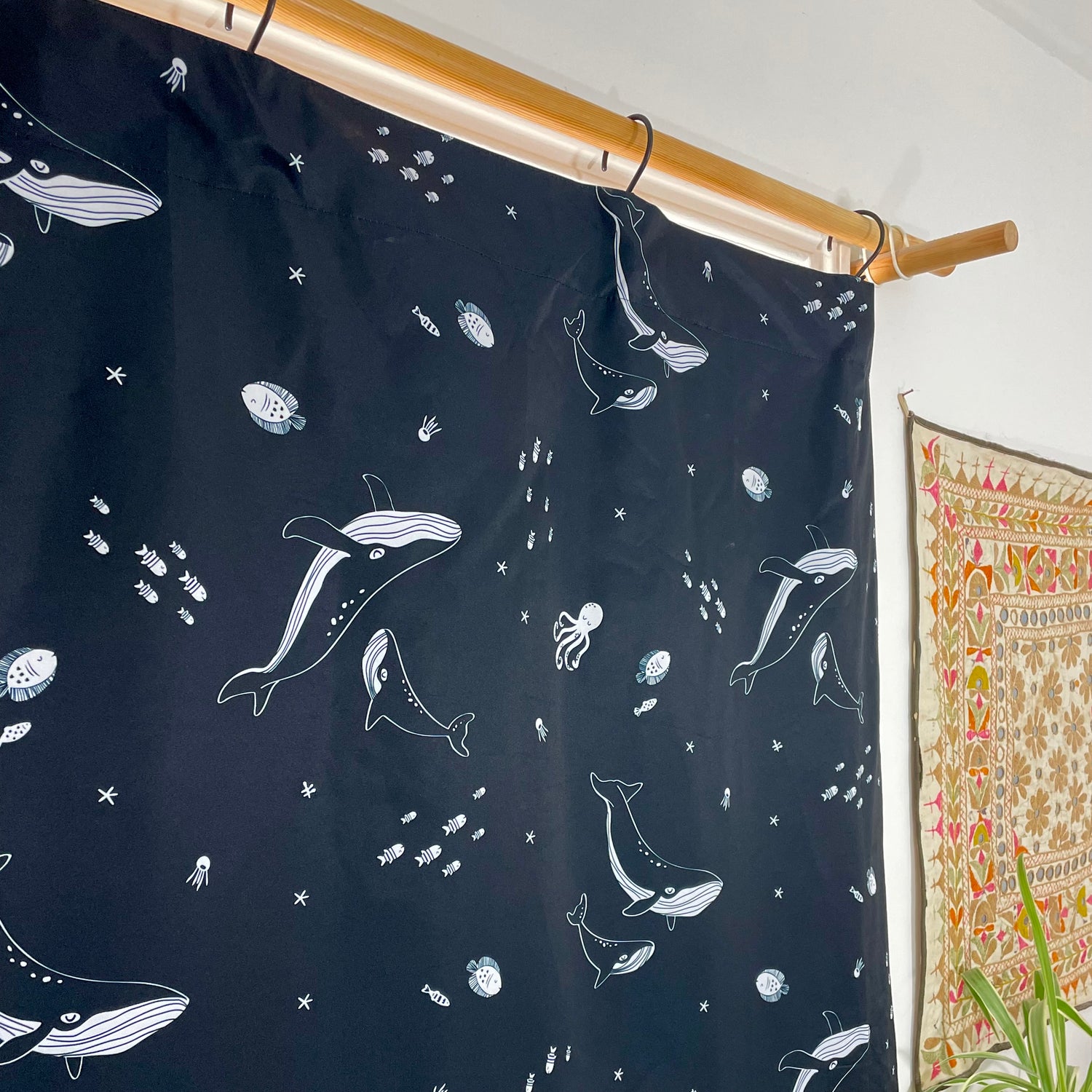 Handi blackout blind with whale design blind hanging from curtain rail